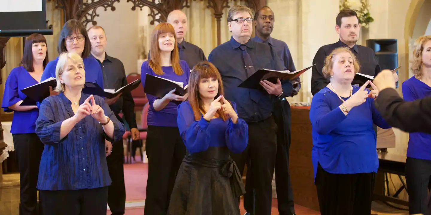 The Heart & Music choir perform using Makaton